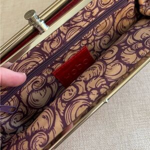 HOBO wallet/clutch, red color, silver detailing, purple designs inside pockets